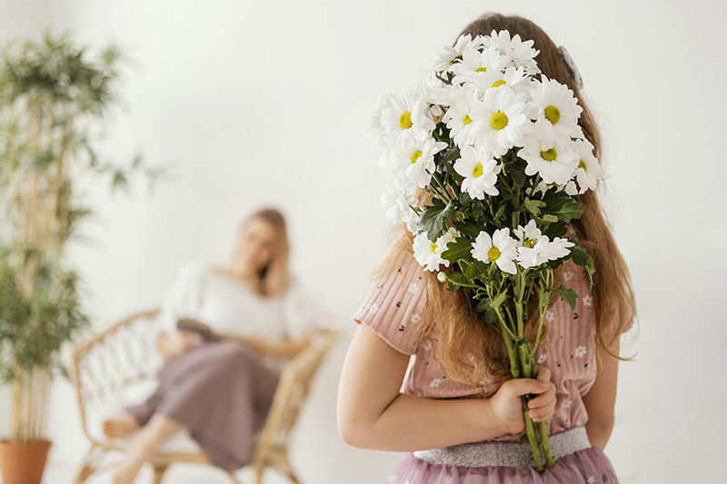 Niña con flores